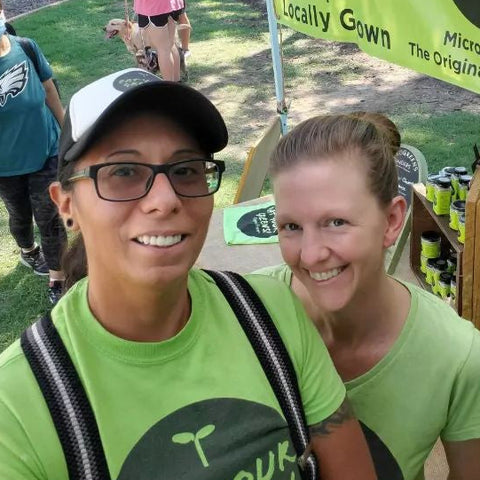 April and Christa Zuniga founders of Eat Your Greens Organic Farm in Austin Texas farmers market